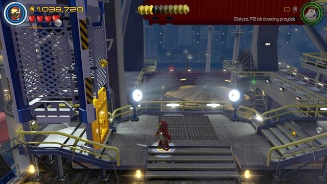 Podejdź do lewej strony i użyj laserów Iron Mana by spalić złote drzwi - Minizestawy | A.I.M. nic się nie IMA - sekrety | LEGO Marvels Avengers - LEGO Marvels Avengers - poradnik do gry