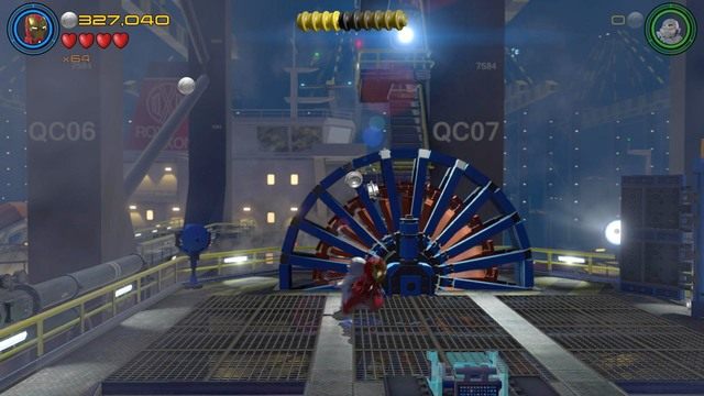 Ostatni żeton ukryty jest za widocznym na obrazku, niebieskim kołem - Postacie | A.I.M. nic się nie IMA - sekrety | LEGO Marvels Avengers - LEGO Marvels Avengers - poradnik do gry