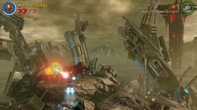 W trakcie walki z bossem, wleć na podest, który widać na obrazku i zniszcz za pomocą lasera złoty pojemnik - Minizestawy | Hen, w Aetherze - sekrety | LEGO Marvels Avengers - LEGO Marvels Avengers - poradnik do gry