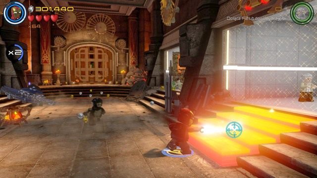 Zaraz po rozpoczęciu misji podejdź do prawej osłony i zniszcz złote schodki za pomocą lasera Iron Mana - Stan Lee / Czerwony klocek | Hen, w Aetherze - sekrety | LEGO Marvels Avengers - LEGO Marvels Avengers - poradnik do gry