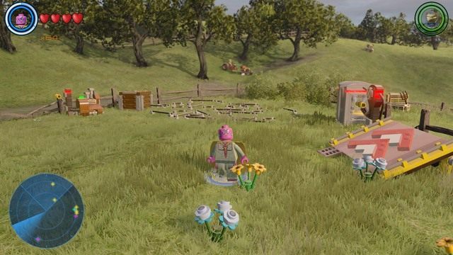 Po lewej stronie domu na farmie znajdziesz miejsce pokazane na obrazku - Złote klocki | Farma Bartona - sekrety | LEGO Marvels Avengers - LEGO Marvels Avengers - poradnik do gry