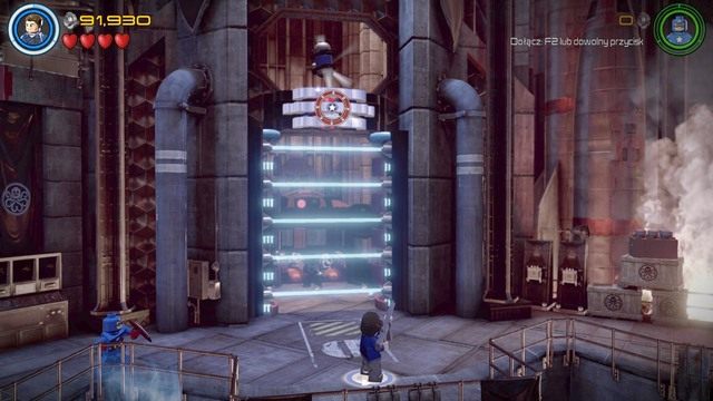 Po przedostaniu się na wyższy poziom lokacji, podejdź do widocznego na obrazu przejścia i wystrzel hak w stronę zaczepu jako Barnes - Kolej na Hydrę | Opis przejścia | LEGO Marvels Avengers - LEGO Marvels Avengers - poradnik do gry