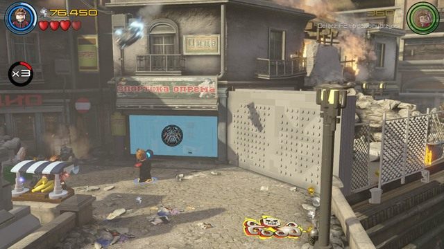 Po zmianie postaci, zacznij kontrolować Scarlet i podejdź do wozu strażackiego, który blokuje dostęp do okna - Świt Ultrona | Opis przejścia | LEGO Marvels Avengers - LEGO Marvels Avengers - poradnik do gry