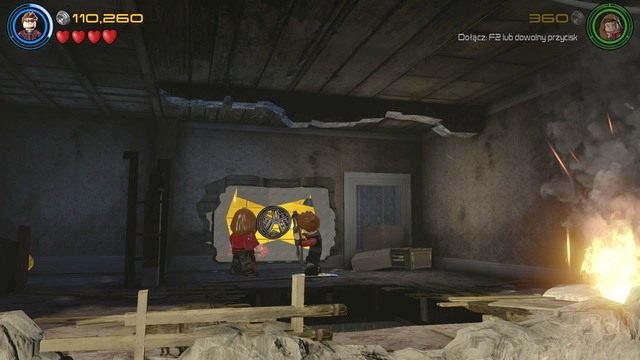 Na pierwszym piętrze znajdziesz ścianę ze złota, którą zniszczysz za pomocą strzał termicznych Hawkeyea - Świt Ultrona | Opis przejścia | LEGO Marvels Avengers - LEGO Marvels Avengers - poradnik do gry