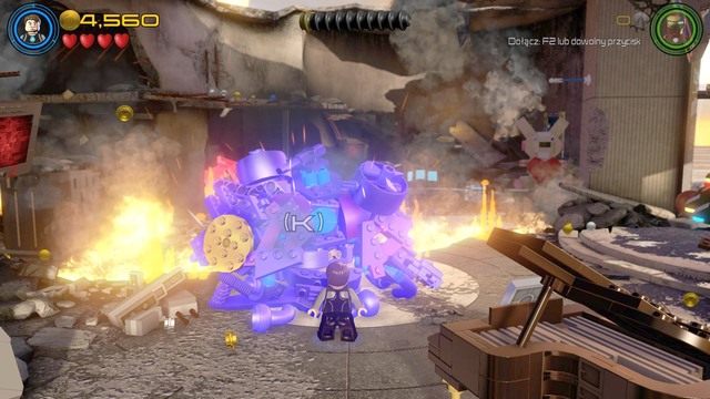 Po odzyskaniu panowania nad postacią, podejdź jako Stark do zniszczonego robota na środku i napraw go - A.I.M. nic się nie IMA | Opis przejścia | LEGO Marvels Avengers - LEGO Marvels Avengers - poradnik do gry