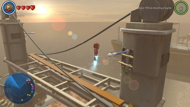 Żeby to zrobić musisz zawiesić się na czterech drążkach pokazanych na obrazku - Złote klocki | Południowa Afryka - sekrety | LEGO Marvels Avengers - LEGO Marvels Avengers - poradnik do gry