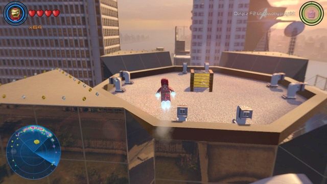 W miejscu pokazanym na obrazku znajdziesz osłonę chroniącą złotą ścianę - Złote klocki | Północny Manhattan - sekrety | LEGO Marvels Avengers - LEGO Marvels Avengers - poradnik do gry
