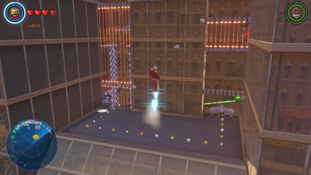 Na jedynym szklanym budynku znajdziesz kolejną zagadkę - Złote klocki | Północny Manhattan - sekrety | LEGO Marvels Avengers - LEGO Marvels Avengers - poradnik do gry