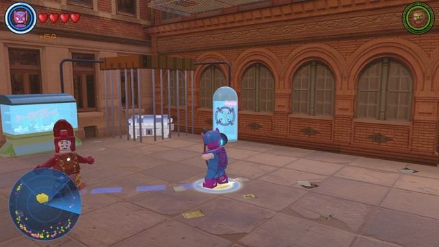 Kolejny złoty klocek znajduje się między budynkami, w centralnej części - Złote klocki | Centralny Manhattan - sekrety | LEGO Marvels Avengers - LEGO Marvels Avengers - poradnik do gry