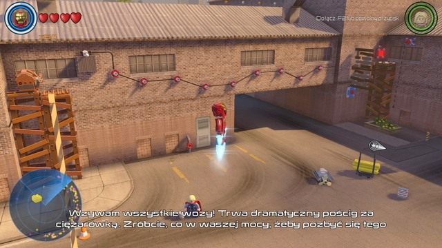 W dzielnicy robotniczej znajdziesz hangar, przy którym znajduje się kolejny pojemnik z klockiem - Złote klocki | Centralny Manhattan - sekrety | LEGO Marvels Avengers - LEGO Marvels Avengers - poradnik do gry