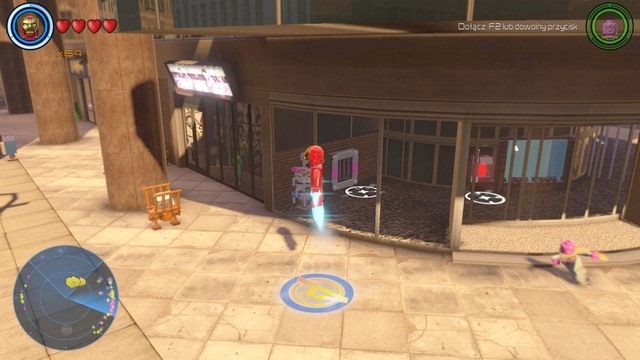 W budynku we wschodniej części Manhattanie znajdziesz pokazaną na obrazku zagadkę - Złote klocki | Centralny Manhattan - sekrety | LEGO Marvels Avengers - LEGO Marvels Avengers - poradnik do gry