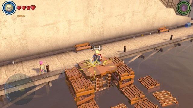 W zachodniej części południowego Manhattanu znajdziesz pokazaną na obrazku zagadkę - Złote klocki | Południowy Manhattan - sekrety | LEGO Marvels Avengers - LEGO Marvels Avengers - poradnik do gry