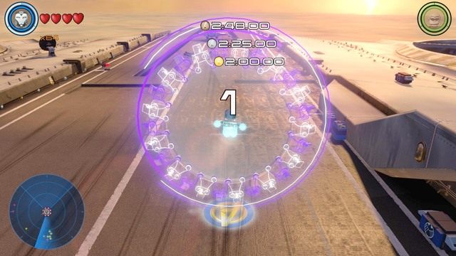 Do pierwszego wyścigu na Helicarrierze stań postacią potrafiącą latać i ukończ go w wymaganym czasie by zdobyć żeton pojazdu - Myśliwiec odrzutowy S - Wyścigi | Helicarrier S.H.I.E.L.D. - sekrety | LEGO Marvels Avengers - LEGO Marvels Avengers - poradnik do gry