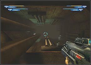 To sala, w której wcześniej widziałeś człowieka uwięzionego pod wrotami - Mining Complex Entrance | Sanctuary | Unreal II The Awakening - Unreal II: The Awakening - poradnik do gry