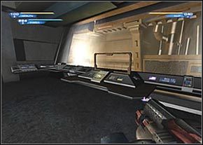 Skorzystaj z pobliskich drzwi by dostać się na druga stronę sali - Discovery | Hell | Unreal II The Awakening - Unreal II: The Awakening - poradnik do gry