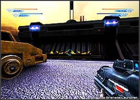 Musisz skręcić w lewo, w stronę widocznej w oddali, również żółtej machiny - Outside the Terraforming Plant - część 1 | Acheron | Unreal II The Awakening - Unreal II: The Awakening - poradnik do gry