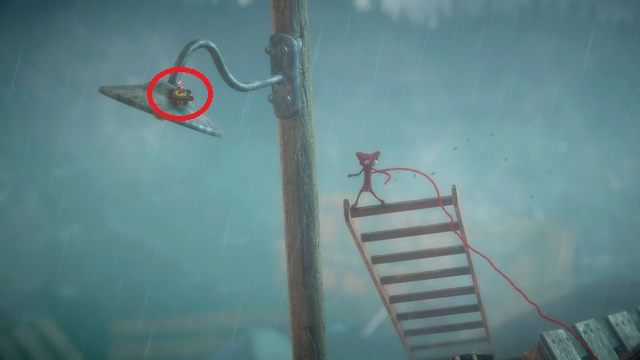 Na lampie na lewo od generatora znajdziesz guzik - Poziom 6 - Down in a Hole | Sekrety w Unravel - guziki - Unravel - poradnik do gry