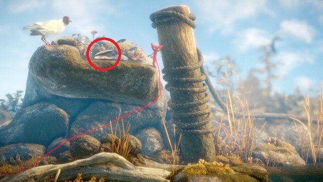 W kolejnym etapie wespnij się po drewnianym palu koło mewy - Poziom 2 - The Sea | Opis przejścia Unravel - Unravel - poradnik do gry