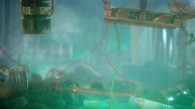 Wybij się na trampolinie i pociągnij łańcuch trzymający beczki - Poziom 6 - Down in a Hole | Opis przejścia Unravel - Unravel - poradnik do gry