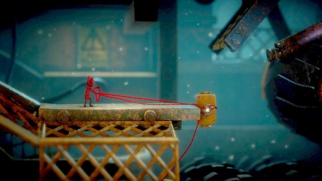 Wyciągnij jeden z żółtych elementów stojąc na bezpiecznej pozycji koło zgniatarki - Poziom 10 - Rust | Opis przejścia Unravel - Unravel - poradnik do gry