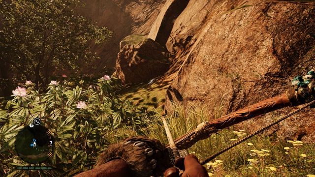 Na ziemi, u podnóża wzgórza, za krzakami - Ręce Daiszy | Południowe Oros | Far Cry Primal - Far Cry Primal - poradnik do gry