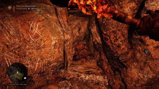 Tropiciel chowa się w niewielkiej wnęce pomiędzy skałami. - Kościana jaskinia (Poszukiwaczka Saila) | Opis przejścia | Far Cry Primal - Far Cry Primal - poradnik do gry