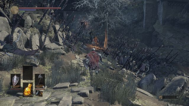 Przy pierwszej wizycie tutaj sprint może okazać się lepszą opcją niż walka z każdym przeciwnikiem, szczególnie pod ostrzałem. - Osada Nieumarłych - od dużego placu, droga na wprost | Opis przejścia - Dark Souls III - opis przejścia i sekrety