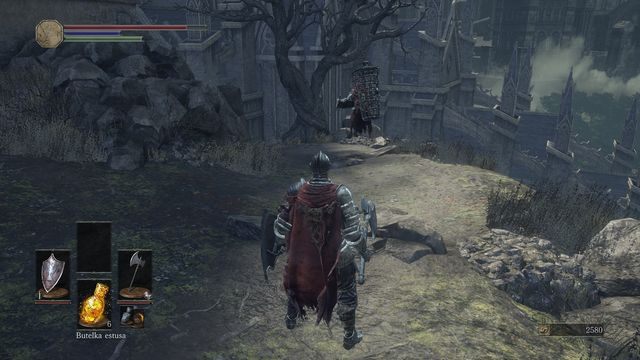 Postać, która przeniesie Cię do zamkniętego miejsca. - Osada Nieumarłych - od dużego placu, droga w prawo przez most | Opis przejścia - Dark Souls III - opis przejścia i sekrety