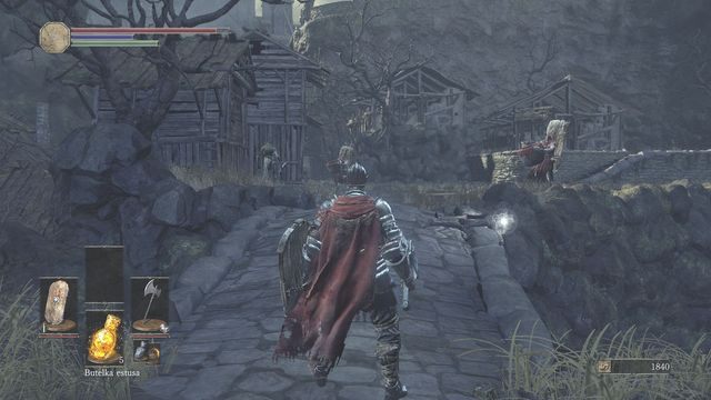 Zaraz za mostem uważaj na silnych przeciwników rzucających kociołkami. - Osada Nieumarłych - od dużego placu, droga w prawo przez most | Opis przejścia - Dark Souls III - opis przejścia i sekrety
