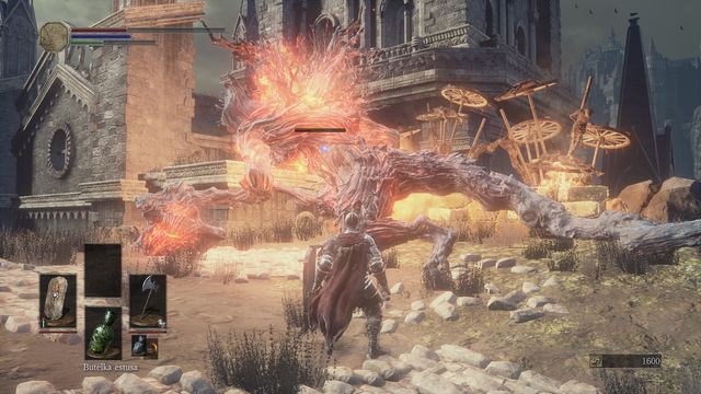 Bez wahania atakuj demona od tyłu, gdy zajęty jest on walką z Twoim sojusznikiem. - Osada Nieumarłych - od dużego placu, droga w prawo przez most | Opis przejścia - Dark Souls III - opis przejścia i sekrety