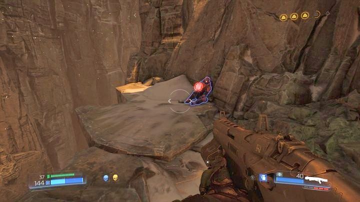 Zanim przejdziesz przez wrota wróć do wyjścia z tunelu, gdzie zaatakował cię Cacodemon i dobrze przeszukaj pobliski teren - Sanktuarium Kadingir | Opis przejścia | Doom - Doom - poradnik do gry