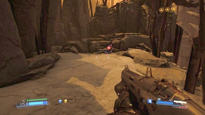 Z prawej strony znajdziesz Elitarnego Strażnika, a z lewej dwa Dzienniki zapytań (jeden w formie runicznego kamienia) - Sanktuarium Kadingir | Sekrety | Doom - Doom - poradnik do gry