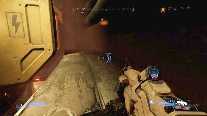 Gdy droga stanie się wolna, wskocz do środka, biegnij przed siebie, a następnie zeskocz w dół na półkę z lewej - Wieża Energii Argentu | Opis przejścia | Doom - Doom - poradnik do gry