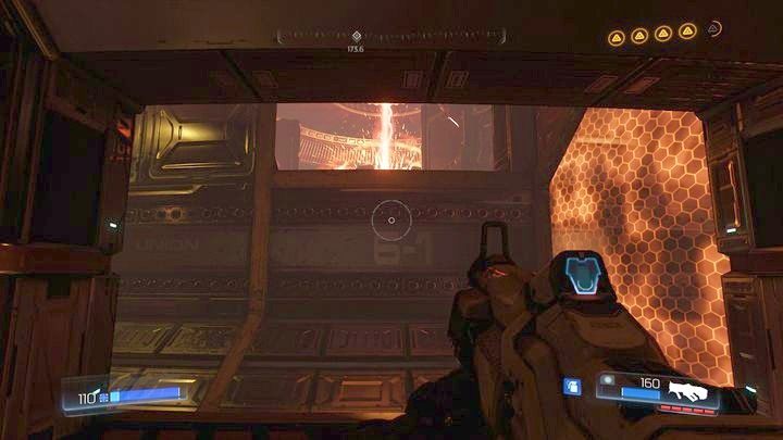 Po dotarciu do miejsca z kontenerami niemal na samym szczycie wieży, poczekaj, aż droga będzie wolna, a następnie doskocz do wyjścia z drugiej strony tunelu - Wieża Energii Argentu | Sekrety | Doom - Doom - poradnik do gry