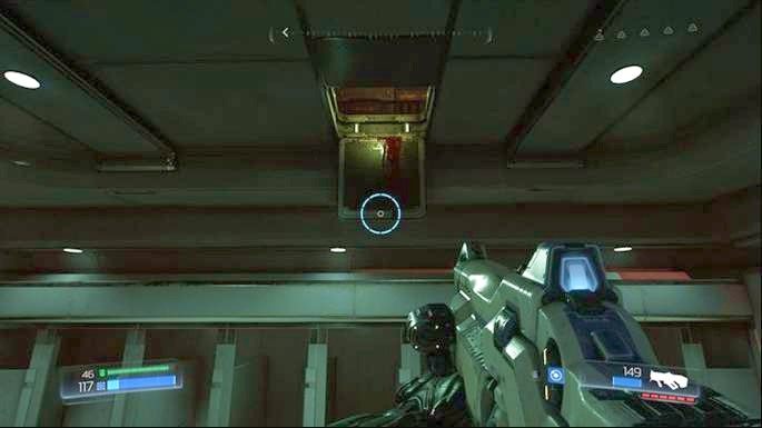 Jak wyjdziesz z pokoju, będziesz mijał święcące na czerwono drzwi, za którymi znajduje się Automapa oraz Elitarny Strażnik - Kompleks Badań | Opis przejścia | Doom - Doom - poradnik do gry