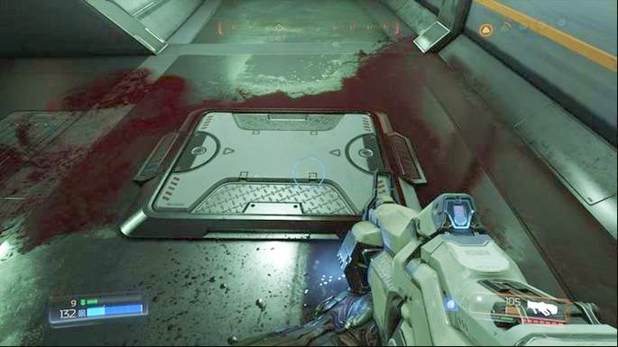 Możesz teraz wrócić na górę i przejść przez drzwi na końcu pomieszczenia - Laboratoria Lazarus | Opis przejścia | Doom - Doom - poradnik do gry