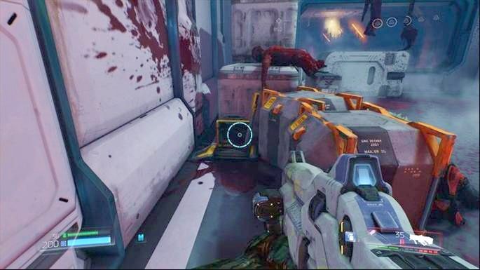 Zanim jednak zeskoczysz na dół, użyj dźwigni ukrytej za skrzyniami z prawej - Centrum przetwarzania VEGI | Opis przejścia | Doom - Doom - poradnik do gry