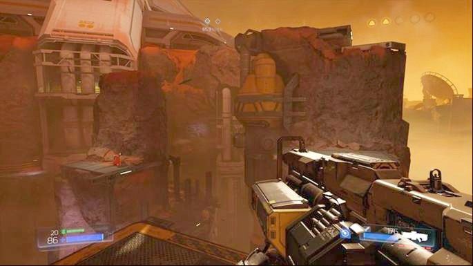 Po zagraniu na automacie możesz wyjść na zewnątrz przez śluzę i ruszać dalej w lewo - Kompleks Badań | Sekrety | Doom - Doom - poradnik do gry