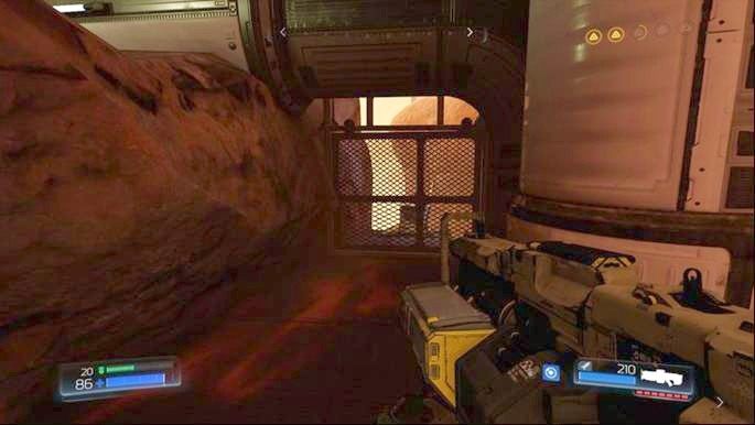 Po wyjściu z tunelu, gdzie była ukryta figurka spójrz w lewo - Kompleks Badań | Sekrety | Doom - Doom - poradnik do gry