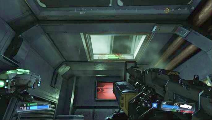 Po ulepszeniu broni u drona wdrap się poziom wyżej przez szyb w suficie - Laboratoria Lazarus | Sekrety | Doom - Doom - poradnik do gry