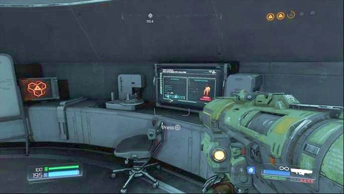 Po usunięciu zabezpieczeń z Kamienia Helixa sprawdź jeden z komputerów przy ścianie - Laboratoria Lazarus | Sekrety | Doom - Doom - poradnik do gry