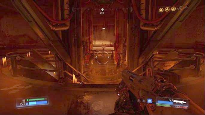 Po użyciu Kamienia Helixa, zabij demony, obejrzyj hologram, a następnie wejdź w korytarz z prawej - Laboratoria Lazarus | Sekrety | Doom - Doom - poradnik do gry