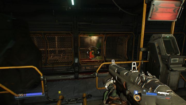 Udaj się ponownie do windy za siatką po prawej i przejść tunelem do drugich żółtych drzwi, które wcześniej mijałeś - Dział Zasobów | Opis przejścia | Doom - Doom - poradnik do gry