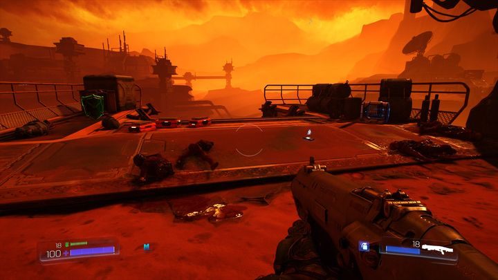 Jak ją wykonasz, wejdź ponownie na wspomniane wcześniej skrzynie, a następnie doskocz do półki skalnej z prawej - UAC | Opis przejścia | Doom - Doom - poradnik do gry