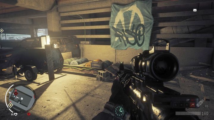 Po przeskoczeniu na górę, wjedź motorem na widoczny na obrazku mechanizm by doładować generator potrzebny do uruchomienia komputera na wyższym poziomie parkingu - Czerwona strefa Holloway | Punkty kluczowe - Homefront: The Revolution - poradnik do gry