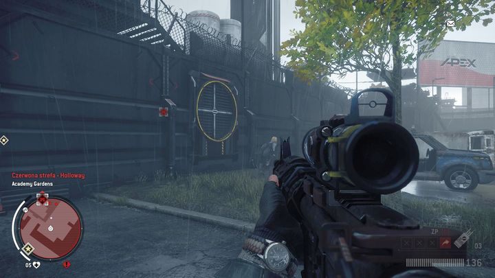 Po wyeliminowaniu wszystkich wrogów na ulicy oraz snajperów, przejdź na tyły placówki i zniszcz osłonę wentylacyjną pokazaną na obrazku, dzięki której dostaniesz się do środka - Czerwona strefa Holloway | Punkty kluczowe - Homefront: The Revolution - poradnik do gry