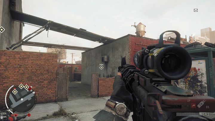 Po dotarciu na miejsce skaner, przejdź na jego tyły gdzie znajdziesz miejsce pokazane na obrazku - Czerwona strefa Holloway | Punkty kluczowe - Homefront: The Revolution - poradnik do gry