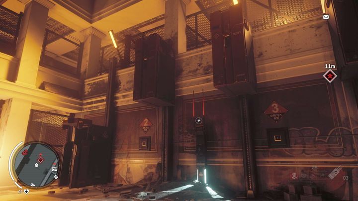 W głównym pomieszczeniu znajdziesz kilka izolatek oraz panel kontrolny, na który musisz rzucić urządzenie hakujące - Zakazana strefa | Punkty kluczowe - Homefront: The Revolution - poradnik do gry