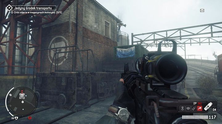 Do pierwszego magazynu dostaniesz się za pomocą kontenera pokazanego na obrazku - Czerwona strefa Elmtree | Magazyny i zlecenia - Homefront: The Revolution - poradnik do gry