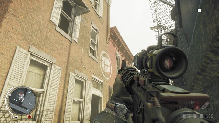 Pierwszy magazyn znajdziesz na drugim piętrze pokazanego na obrazku budynku - Czerwona strefa Lombard | Magazyny i zlecenia - Homefront: The Revolution - poradnik do gry